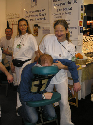 Me giving on-site shiatsu at the Ideal Home Show
