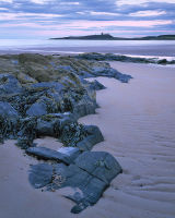 Dunstanburgh from Embleton Bay, Quiet Light at Dusk.