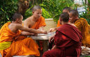 Playing chess in monastery courtyard