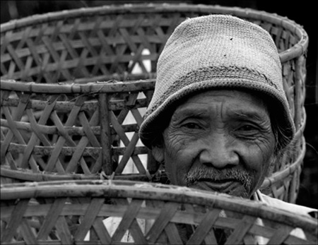 Man carrying baskets