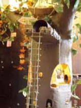 FAIRY TREEHOUSE sculture showing added ladder detail and autumn leaves