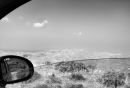 Long, winding, dry and hot road