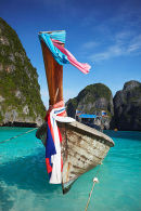 Long Tail Boat Floating On Turquoise Sea, Ko Phi Phi Leh