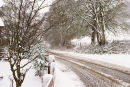 Snowy road by Ullswater
