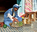 Berber preparing mint tea.