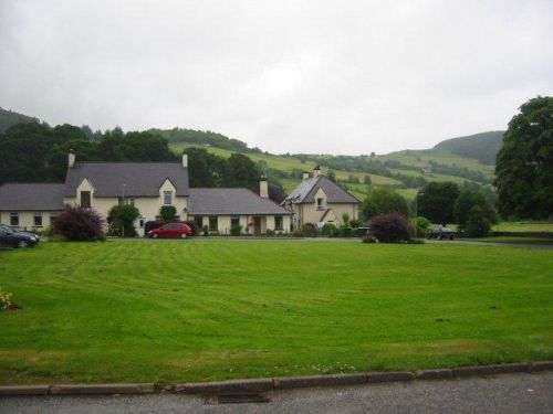 my home (1966): Drumnadrochit, near Inverness (centre bungalow)