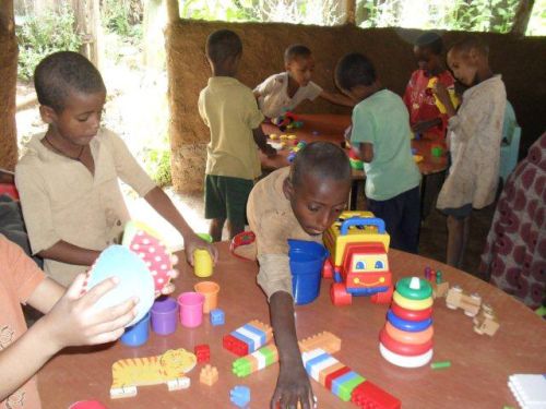 Grade 1s play with toys