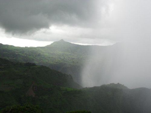 a storm sweeps up towards the escarpment