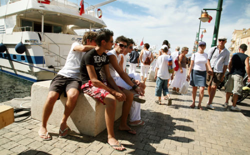 Teenagers on the pier, St Tropez, France