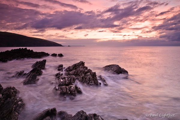 Sunrise, rocks and sea