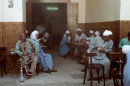 Men relaxing at a coffee bar