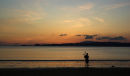 Bagpiper on the beach