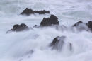 Waves crashing on rocks