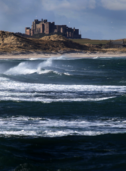 Bamburgh from Seahouses Harbour