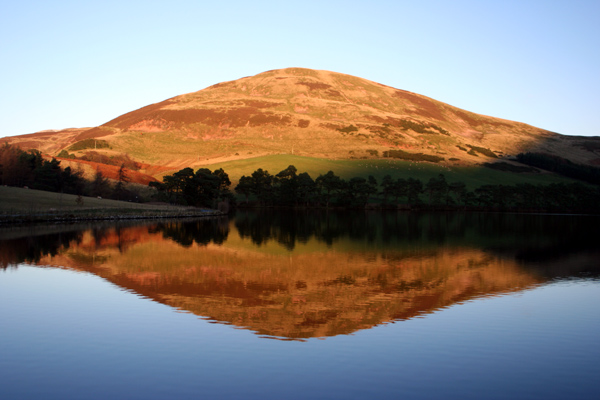 Castlelaw Hill reflected in Glencorse Reservoir