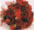 Hand-tied posy in rich shades of red