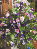 Pedestal arrangement in dreamy pinks and purples