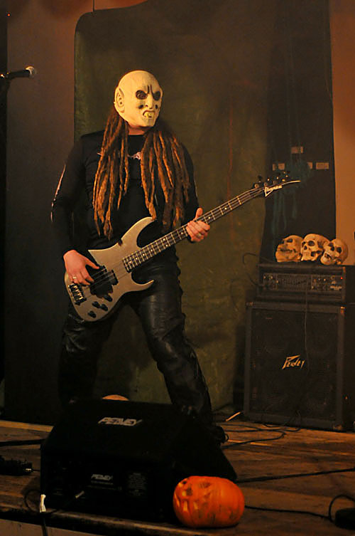 Alike Cooper Bass player, John Buckett opens the Halloween gig in disgiuse
