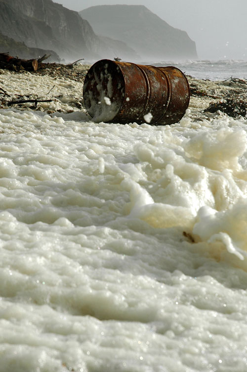 (Oil) Drum washed up on Charmouth Beach, along with alot of foam