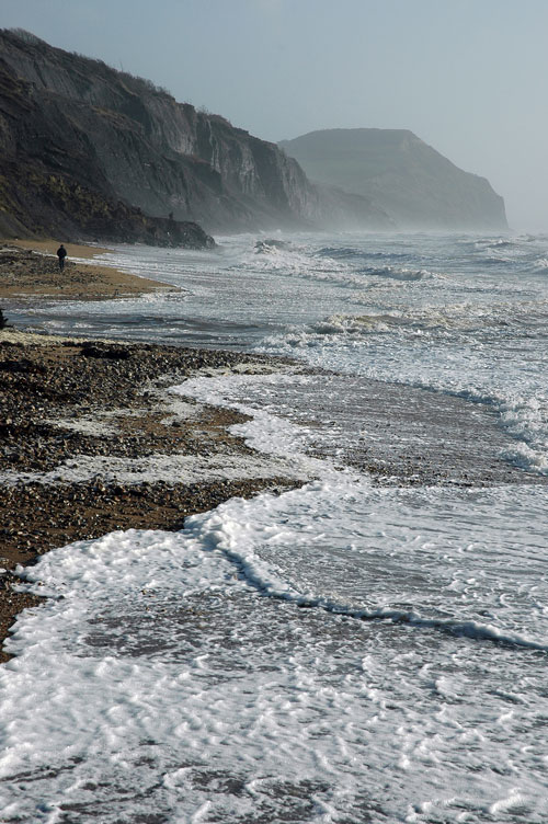 A stormy Charmouth Beach, looking east towards Golden Cap