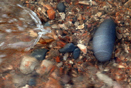 Pebbles on Charmouth beach at the mouth of the River Char