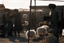 Hat-selling stalls at Tolkuchka Bazaar outside Ashgabad, Turkmenistan. 2000.