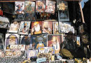 A boy sits at his stall selling Sikh images in New Delhi, India. 2000.