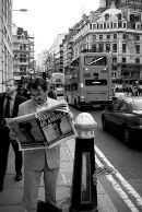 City of London, UK, 2001.
A man reads an evening newspaper reporting on that days attacks on the World Trade Centre in New York.
