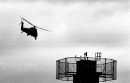 Dungannon, Northern Ireland, 1994.
A British Army helicopter takes-off from the fortified military base.