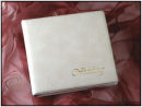 AylesburyStylish padded traditional album.Gently marbled lightly grained cover in cream. Finshed with the word 'Wedding' in the bottom right hand corner in gold.