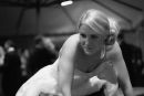 The bride chatting to guests at her wedding