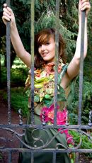 Photograph of a model contrasting with the gate