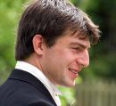 The groom outside the church