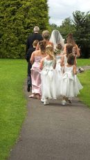 The bridal party arrive at the church