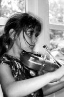 Photograph of a young virtuoso taken at client's home