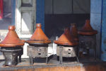 tagines cooking in roadside eatery_02