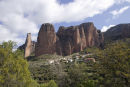 The village of Riglos, nestled under towering cliffs.
