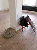 Untitled 2 (red wheelchair)