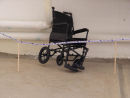 Untitled (black wheelchair)