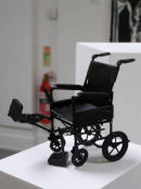 Untitled 2 (black wheelchair)