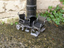 Untitled (grey wheelchair) & Untitled 2 (grey wheelchair)