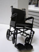 Untitled (black wheelchair)