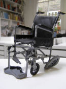 Untitled (grey wheelchair)